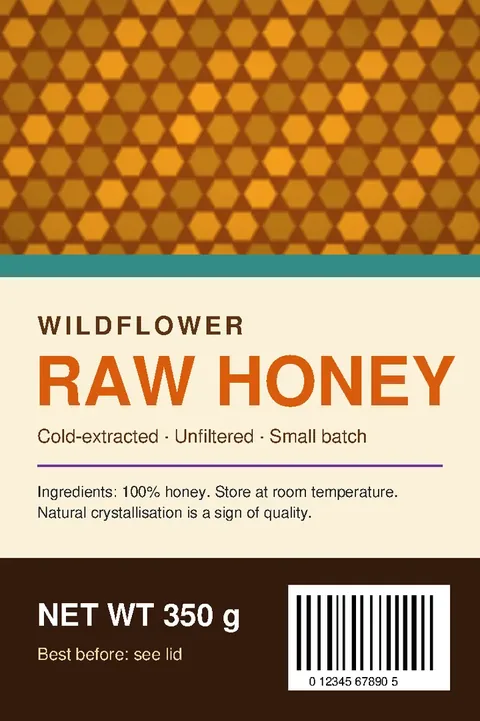 Honey jar label: an orange honeycomb pattern at the top, RAW HONEY in orange on cream, and a dark brown panel with the weight and a barcode